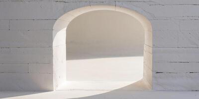 A white archway in a white building photo