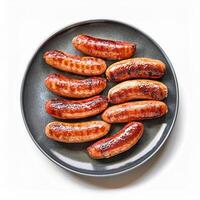 Delicious Grilled Sausages on a Dark Plate Top View A Perfect Image for Cookbooks or Food Blogs photo