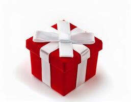 A small red gift box with a white ribbon bow on a white background perfect for holiday or special occasion photo