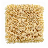 A Close Up Shot of Uncooked Instant Noodles Ready for Preparation Perfect for culinary blogs and recipe websites photo