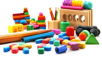 A colorful assortment of toys and blocks on a white surface, including a variety of shapes, colors, and textures. photo