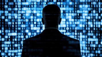 A man in a suit standing in front of a digital binary code background. photo