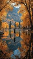 Stunning autumn landscape with a figure reflecting in calm water surrounded by vibrant orange trees photo