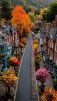 Autumn colors transform a quaint street lined with historic buildings and vibrant trees in a charming village photo