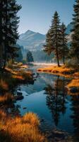 Scenic river and autumn foliage reflecting mountains under clear blue sky in a serene landscape at dawn photo