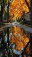 Autumn foliage reflects on a quiet road beside a historic building in a serene landscape photo
