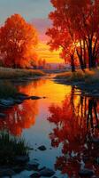 Vibrant autumn landscape with a serene river reflecting orange and yellow hues at sunset photo
