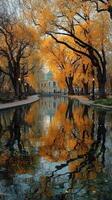 Golden autumn leaves reflecting in tranquil water amid a park setting with historic architecture during late afternoon photo