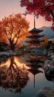 Majestic autumn sunset over traditional pagoda and serene pond in a tranquil Japanese garden photo
