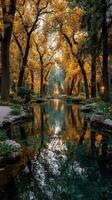 Serene autumn landscape with a tranquil river surrounded by vibrant orange trees and a peaceful pathway in the park photo