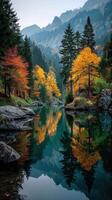 otoño colores reflejar en un tranquilo montaña lago rodeado por vibrante arboles en el temprano Mañana ligero foto