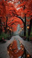 Autumn park path lined with glowing lanterns and vibrant red trees during a misty evening photo