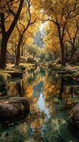 Serene autumn landscape with golden trees reflecting in tranquil stream photo