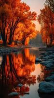 Autumn landscape features vibrant orange trees reflecting in calm river at sunset photo