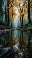 Beautiful autumn forest landscape with misty reflections in a serene stream at dawn photo