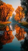 Serene autumn landscape features vibrant orange trees reflecting in a calm river at dusk photo