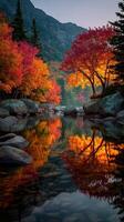 Vibrant autumn landscape reflecting colorful foliage in still water at dawn photo