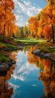 Autumn colors reflect on serene pond in a tranquil golf course setting in late afternoon light photo