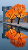 Majestic orange trees reflect in tranquil water next to a modern building during the early morning hours of autumn photo
