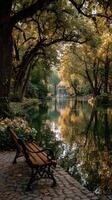 Serene autumn afternoon by tranquil lake with reflection of trees and gazebo in the park photo