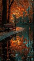 Vivid autumn colors reflecting on a tranquil park path near a peaceful waterway at dusk photo