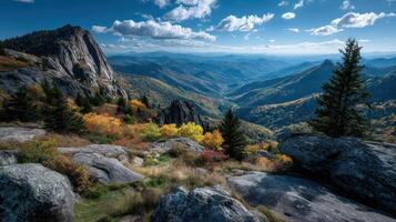 Colorful autumn landscape view from a rocky mountain overlooking a valley in the Blue Ridge Mountains during midday photo