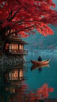 Tranquil autumn evening by the lake with a wooden boat and vibrant red foliage photo