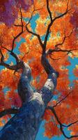 Colorful autumn leaves create a stunning view of a tree against a clear blue sky in a serene outdoor setting during fall photo