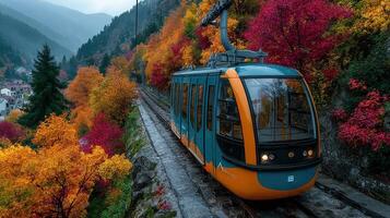 Scenic cable car journey through vibrant autumn foliage in mountainous region photo