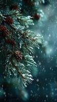 Snow falls on pine branches adorned with cones in a tranquil winter atmosphere at dusk photo