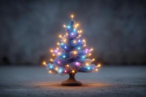 Colorful illuminated mini Christmas tree displayed indoors during festive season photo