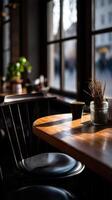 Cozy cafe table with coffee and plants in soft daylight photo