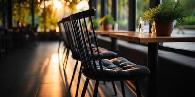 Cafeteria with sunlight casting shadows on wooden tables photo