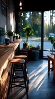 Cozy interior of a cafe with natural light at sunset photo