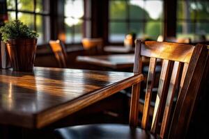 Cozy wooden tables and chairs in a warm restaurant setting photo
