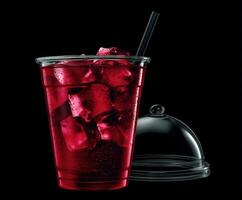 Refreshing fruit beverage served in a clear cup with ice photo