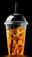 Refreshing iced drink served in clear cup with ice photo