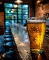Craft beer rests on a wooden bar in a cozy brewery setting photo