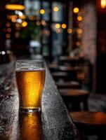 Craft beer on a rustic bar in a cozy pub setting photo