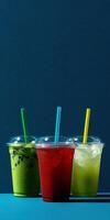 Colorful drinks displayed against a blue backdrop photo