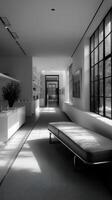A black and white photo of a hallway with a bench