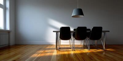 A dining room table with four chairs and a lamp photo