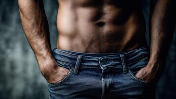Muscular man in fitted jeans showcasing a confident pose photo