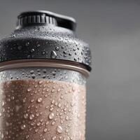 Protein shake in a bottle with condensation in a modern setting photo