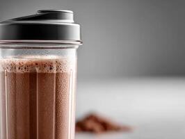 Delicious protein shake in a sleek bottle ready to be enjoyed photo
