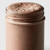 Delicious protein shake in a glass jar ready for consumption photo