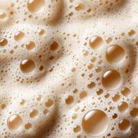 Creamy protein shake with foam and bubbles during breakfast preparation photo