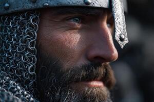 Warrior in chainmail during a re-enactment in a medieval setting photo
