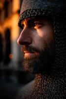 Knight in chainmail gazes into the sunset on a city street photo