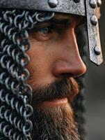 Warrior in chainmail helmet displays strength and determination photo